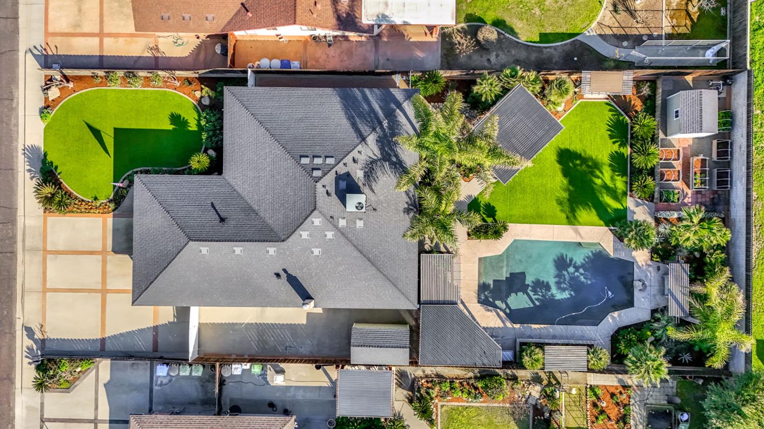 505 Ash Street Lemoore, CA 93245 - Photo 64 of 66 an aerial view of a house with a swimming pool