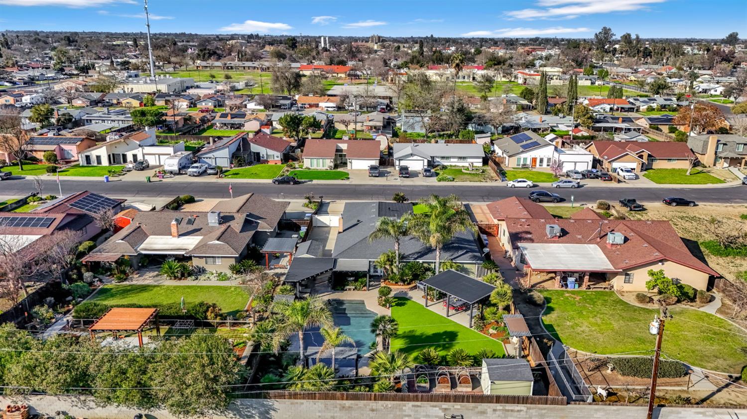 505 Ash Street Lemoore, CA 93245 - Photo 66 of 66 an aerial view of a houses with a swimming pool