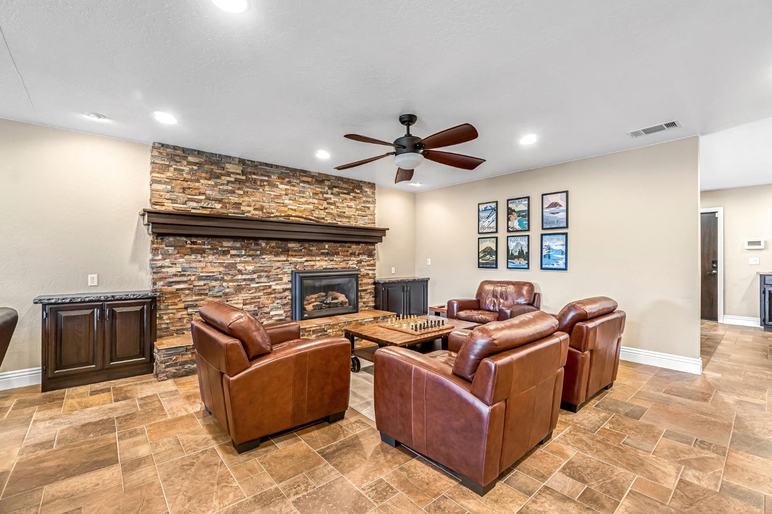 505 Ash Street Lemoore, CA 93245 - Photo 7 of 66 a living room with furniture and a fireplace
