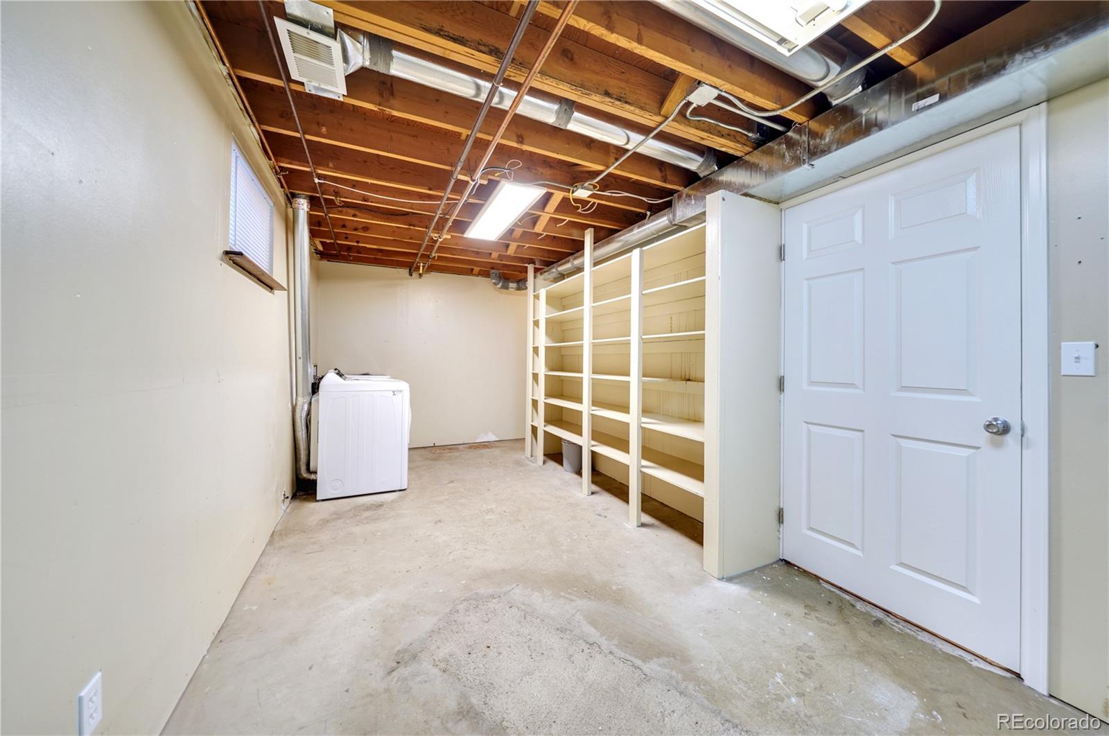 1206 Westmoreland Road Colorado Springs, CO 80907 - Photo 26 of 33 a view of a storage & utility room