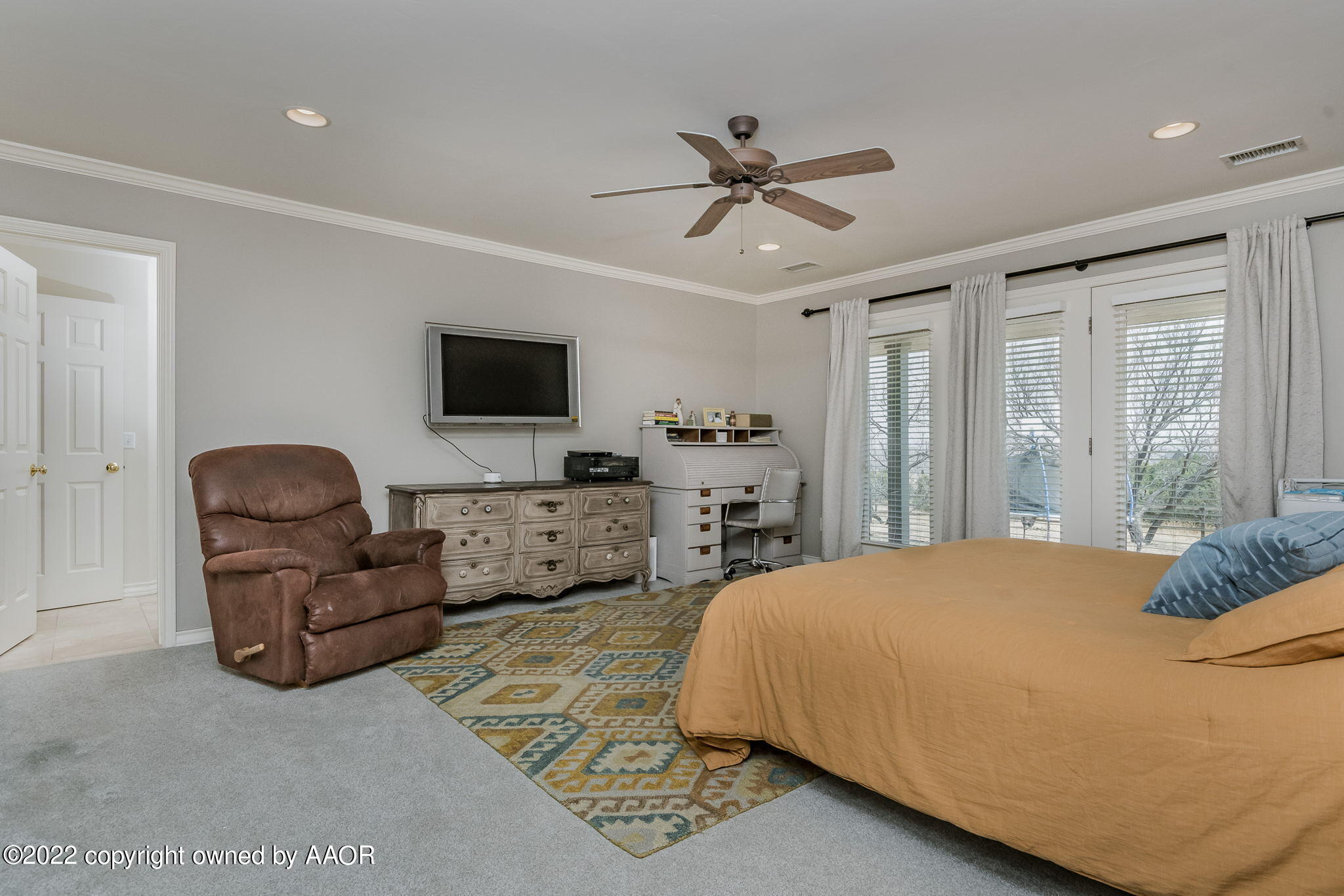 327 Lake Ridge Road Canyon, TX 79015 - Photo 15 of 31 a bedroom with a bed couch and window