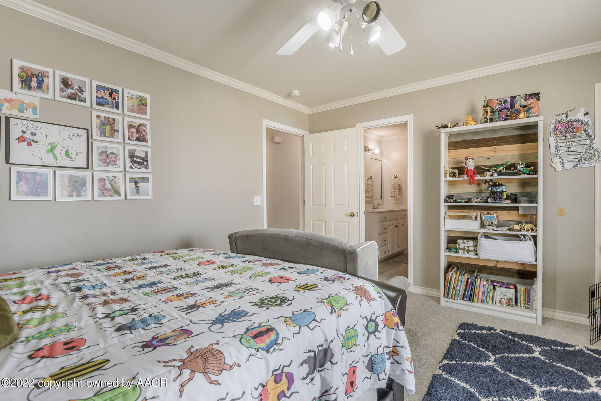 327 Lake Ridge Road Canyon, TX 79015 - Photo 20 of 31 a bedroom with a bed and closet