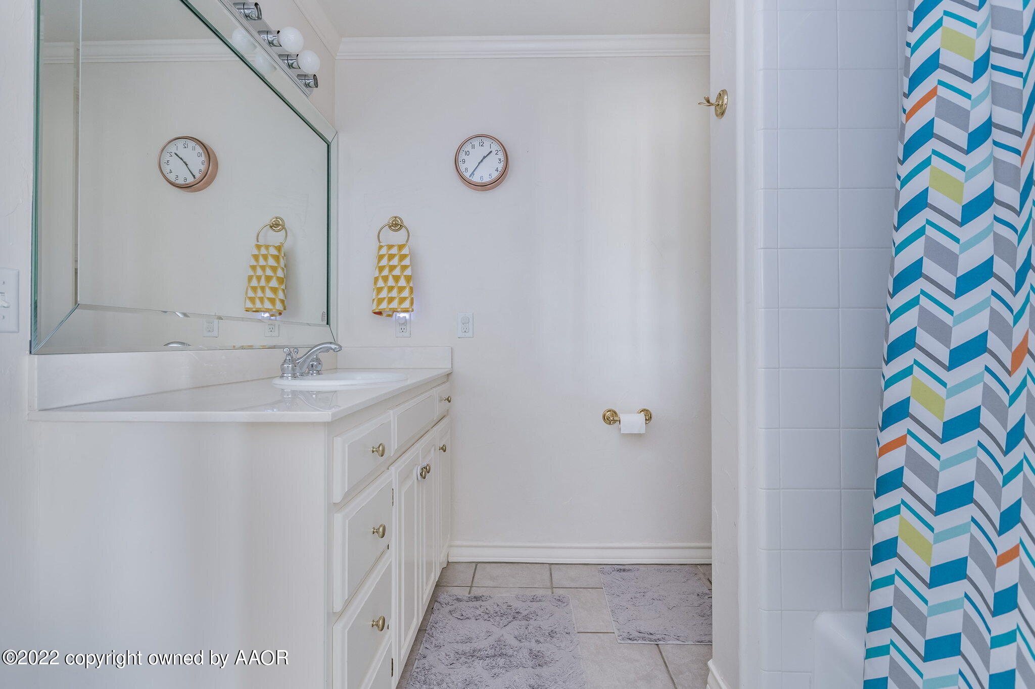 327 Lake Ridge Road Canyon, TX 79015 - Photo 21 of 31 a bathroom with a sink and a shower curtain