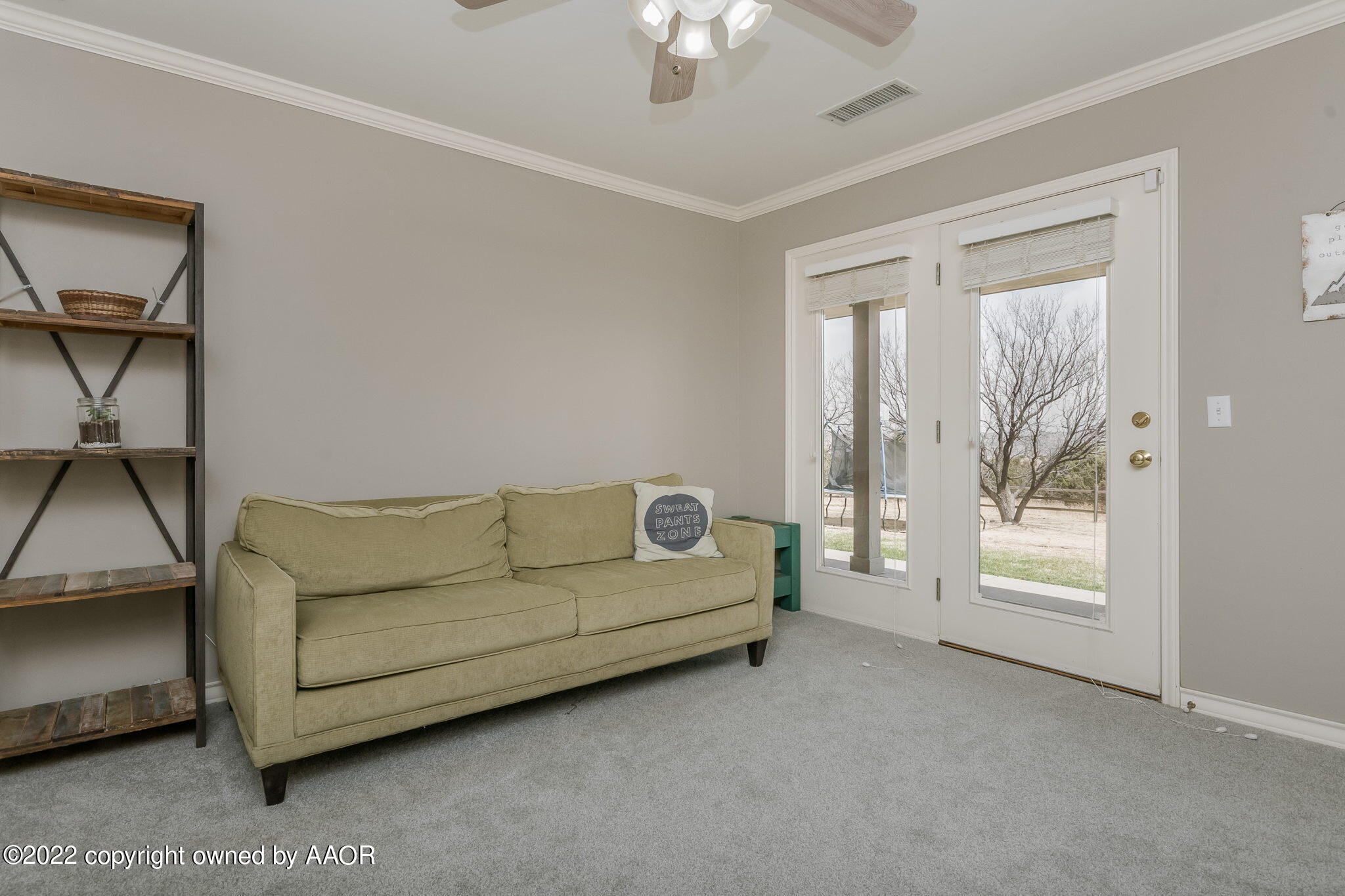 327 Lake Ridge Road Canyon, TX 79015 - Photo 22 of 31 a living room with furniture and a window