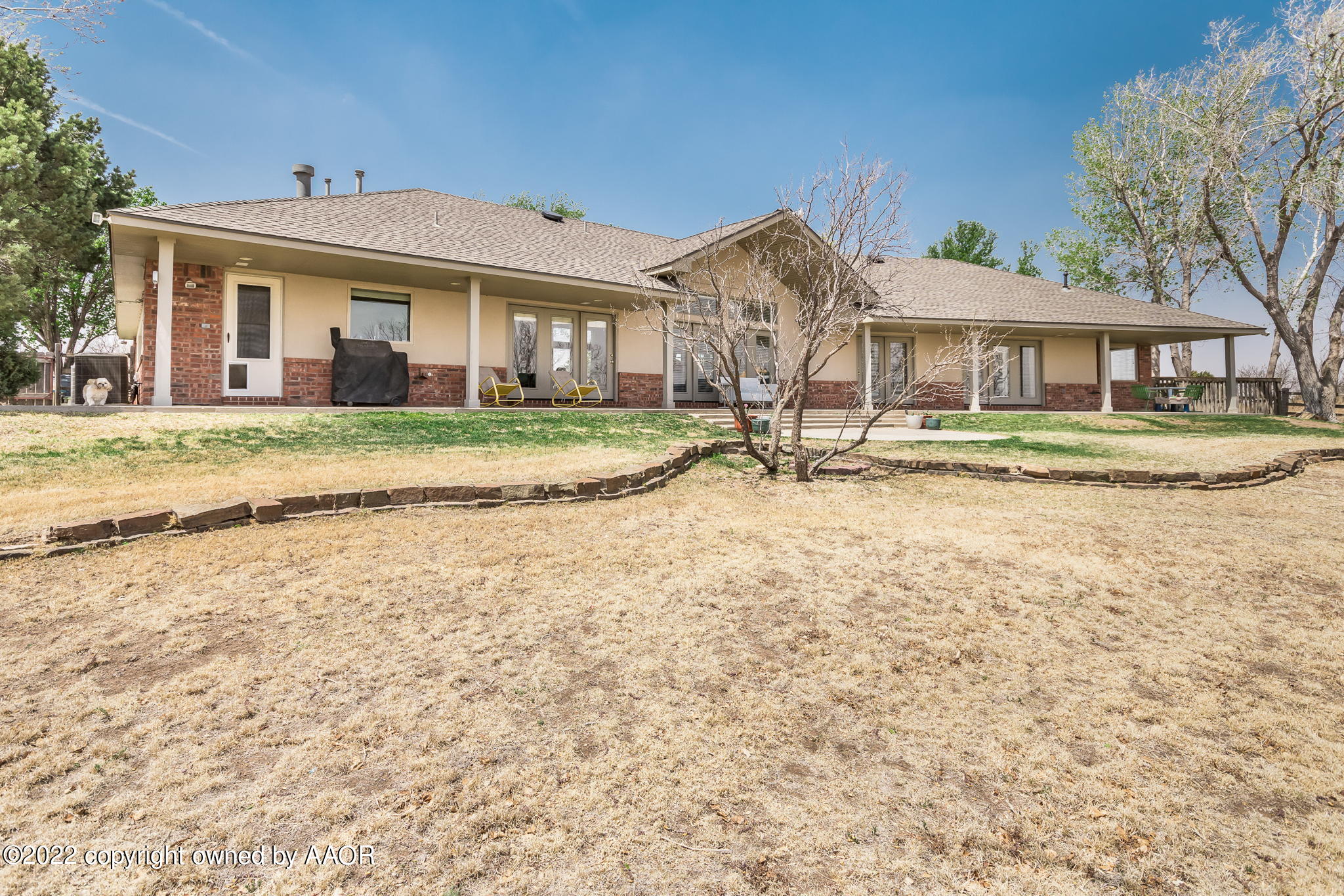 327 Lake Ridge Road Canyon, TX 79015 - Photo 25 of 31 a front view of a house with a yard