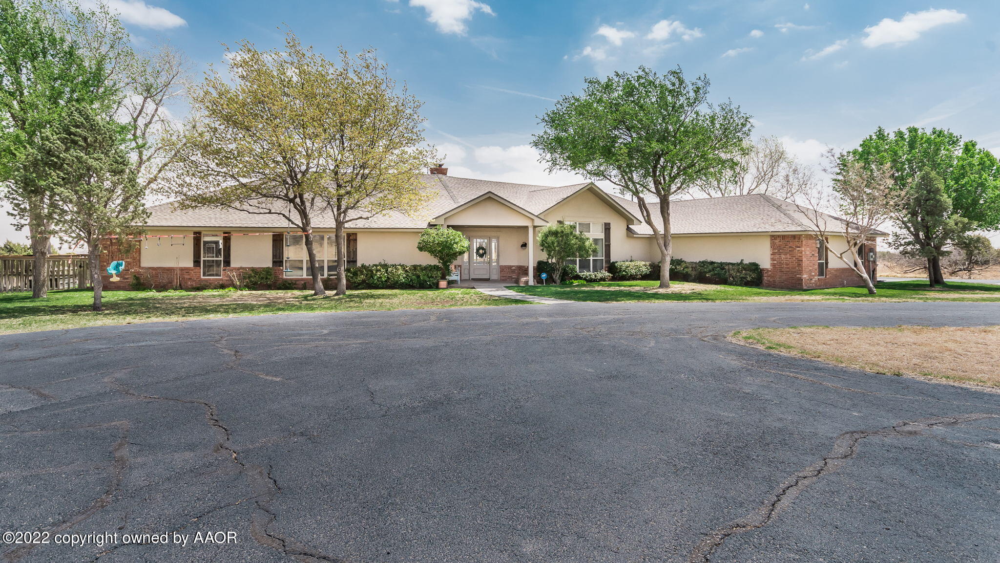 327 Lake Ridge Road Canyon, TX 79015 - Photo 30 of 31 a front view of house with yard and green space