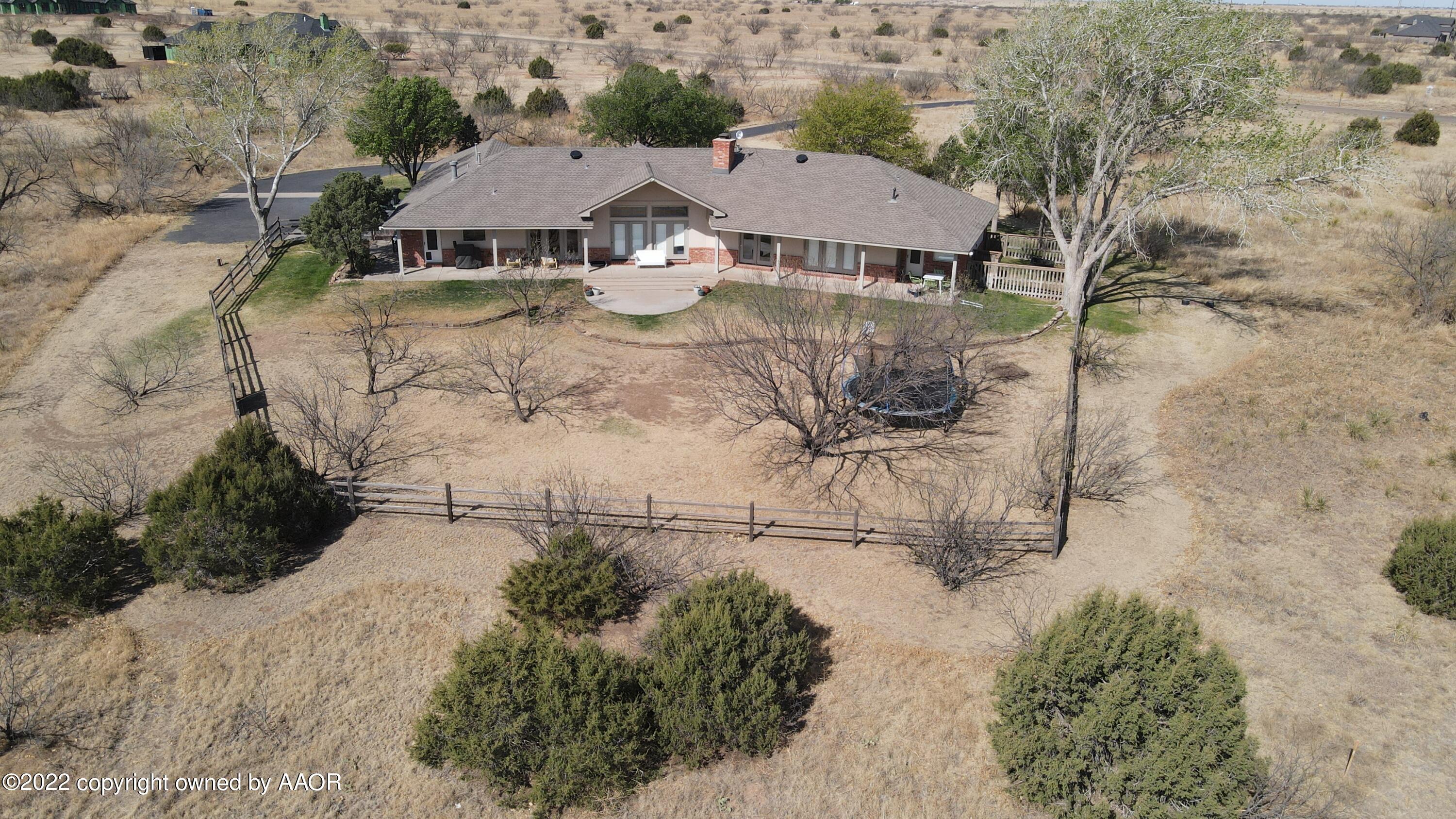 327 Lake Ridge Road Canyon, TX 79015 - Photo 3 of 31 an aerial view of a house with a yard