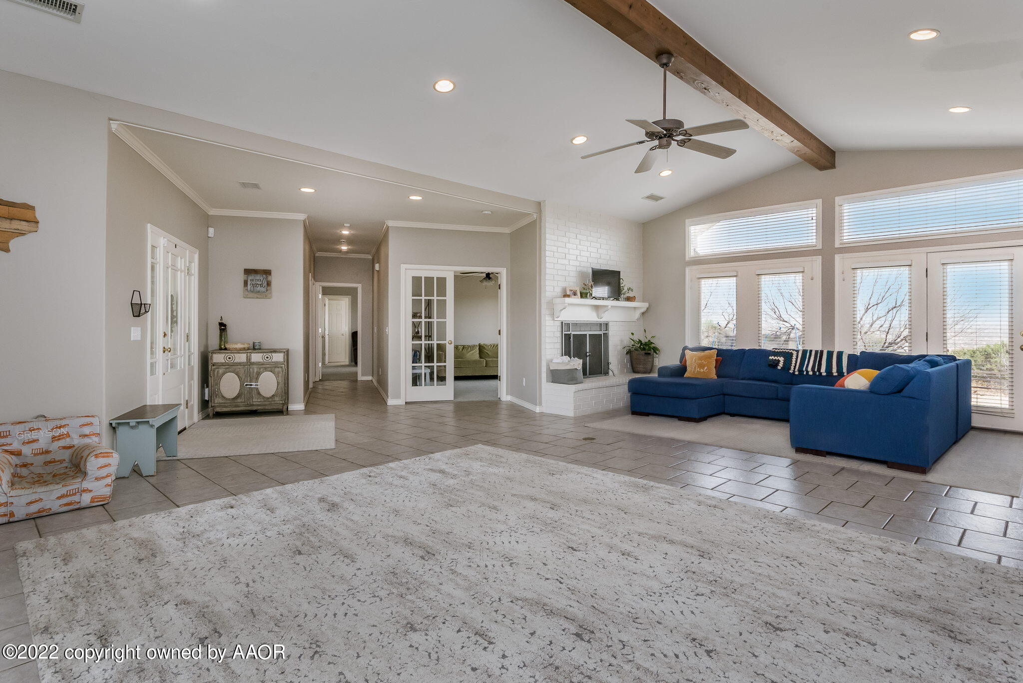 327 Lake Ridge Road Canyon, TX 79015 - Photo 5 of 31 a large room with a large bed and furniture