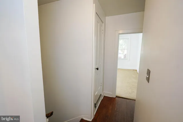 a bathroom with a sink and a window