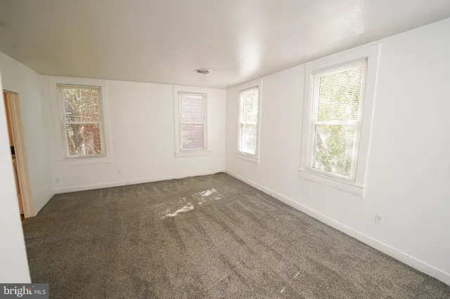 an empty room with a door