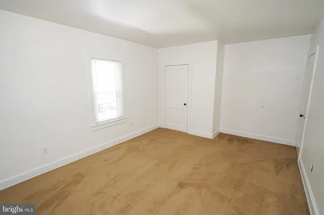 a view of small space with wooden floor