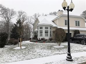 137 Winding Ridge Road, Unit 137 White Plains, NY 10603 - Photo 1 of 1 a front view of a house with garden
