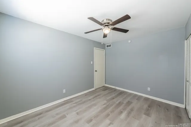 a view of a big room with wooden floor