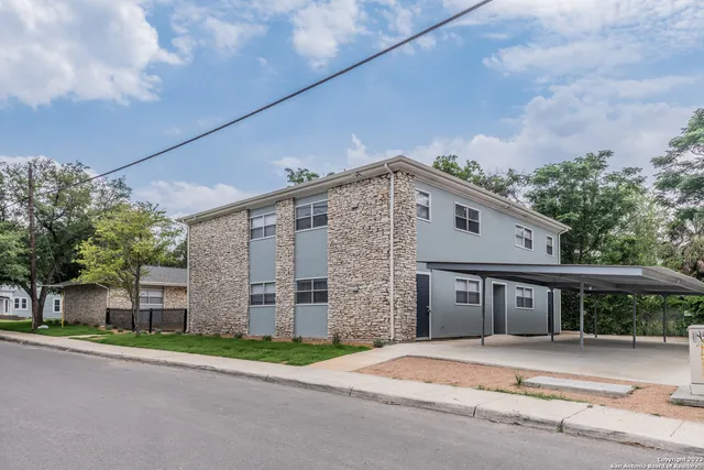 a brick building with a large windows