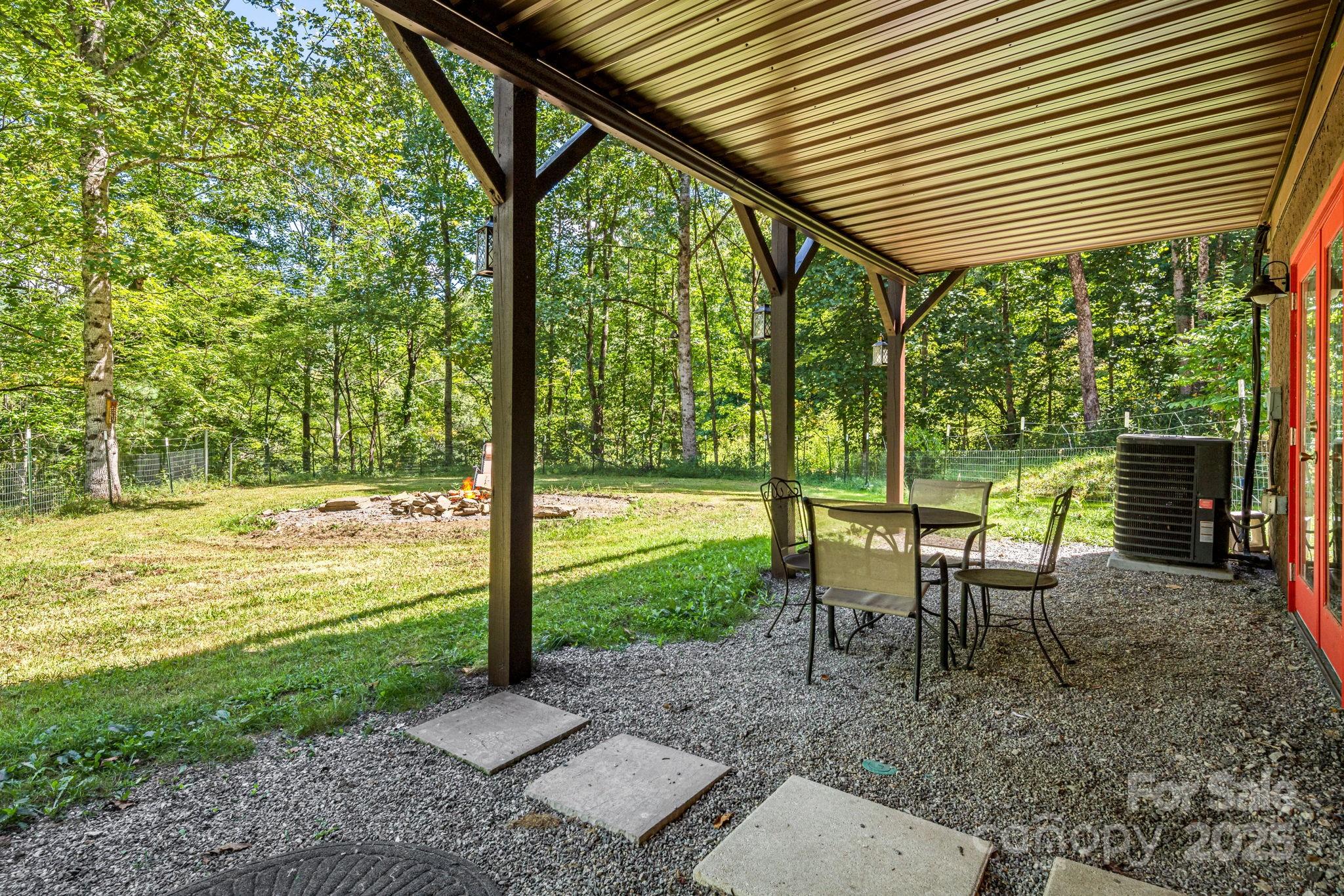 6018 Meadow Fork Road Hot Springs, NC 28743 - Photo 29 of 31 a view of a chairs and table in patio