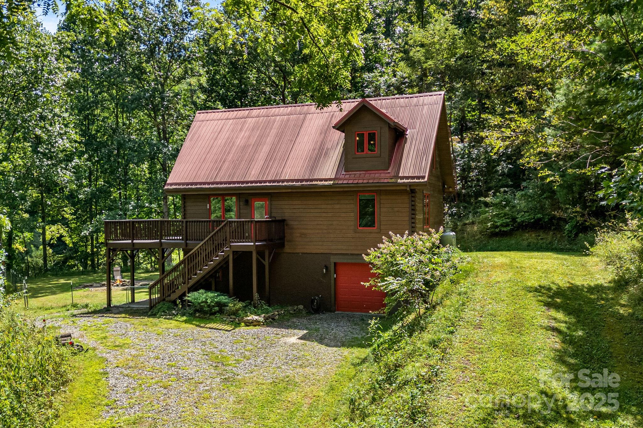 6018 Meadow Fork Road Hot Springs, NC 28743 - Photo 31 of 31 a house with trees in front of it