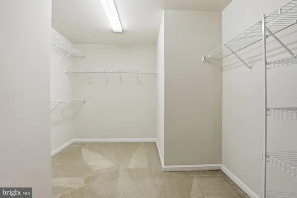 a view of a room with racks on the wall