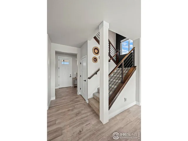 a view of an entryway with stairs