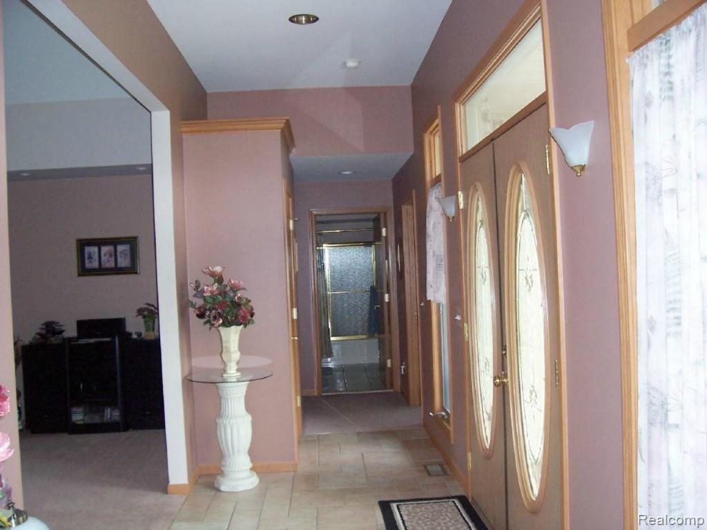 14470 Hough Road Allenton, MI 48002 - Photo 3 of 39 front entry doors and hallway