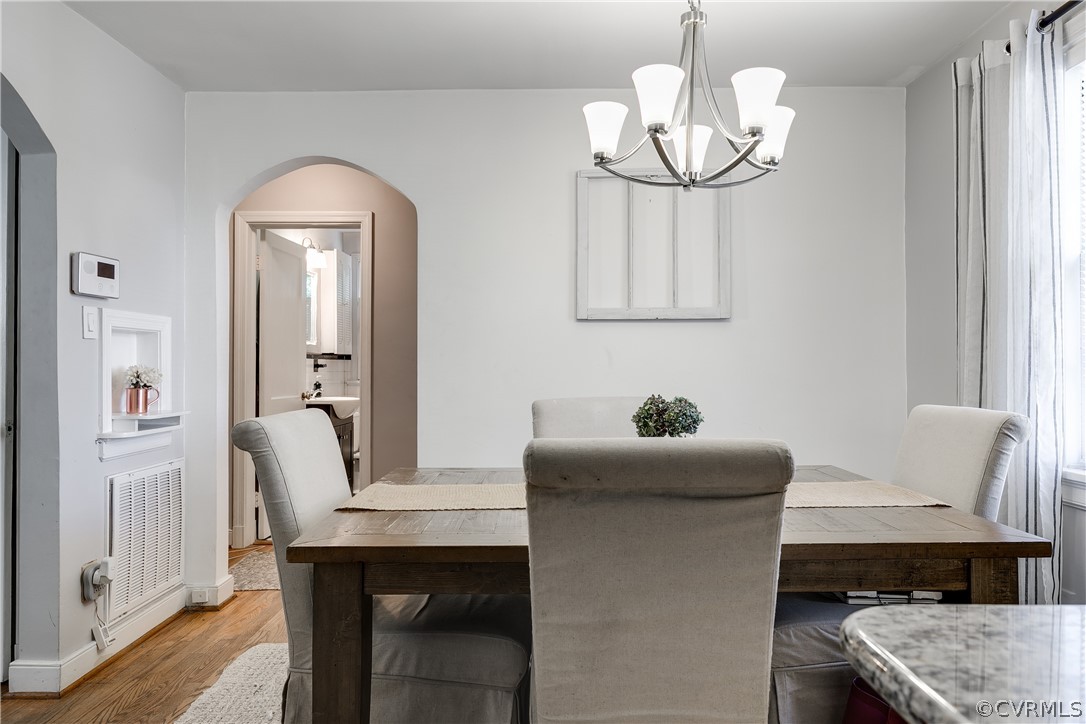 3926 Brook Road Richmond, VA 23227 - Photo 11 of 25 a dining room with a table and chairs