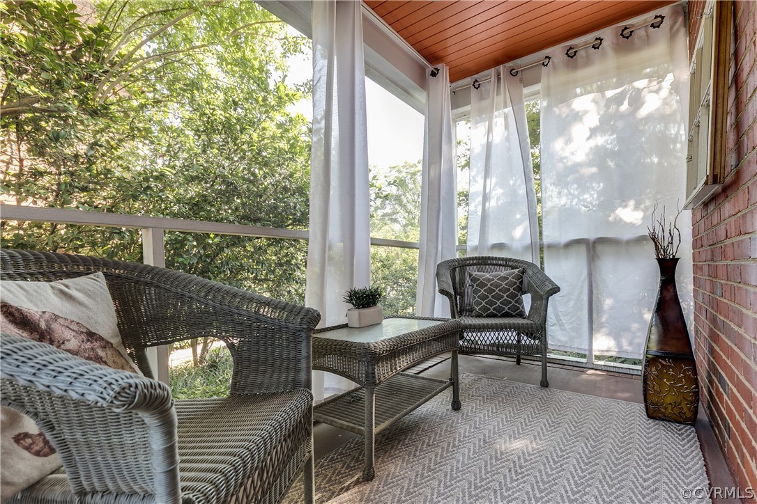 3926 Brook Road Richmond, VA 23227 - Photo 20 of 25 a balcony with furniture and a potted plant