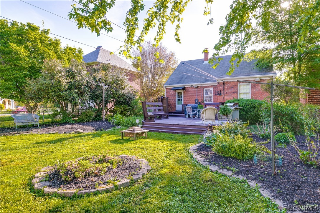 3926 Brook Road Richmond, VA 23227 - Photo 23 of 25 a view of a house with swimming pool and sitting area