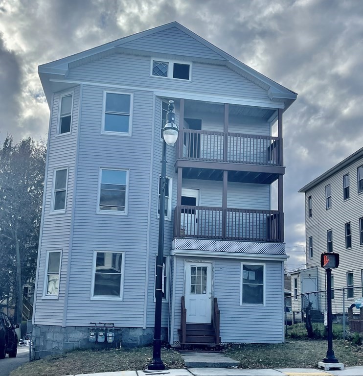 8 Massasoit Road Worcester, MA 01604 - Photo 2 of 21 a front view of a house with balcony