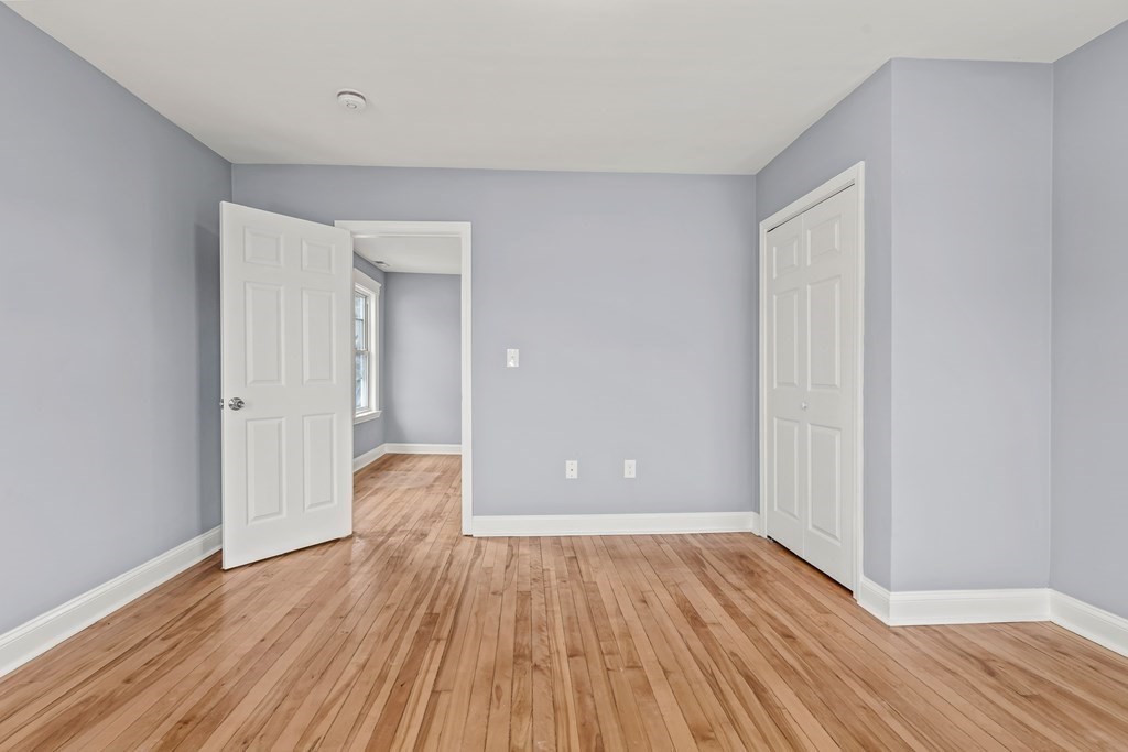 8 Massasoit Road Worcester, MA 01604 - Photo 5 of 21 a view of an empty room and wooden floor