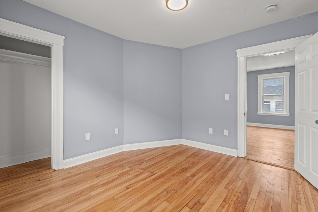 8 Massasoit Road Worcester, MA 01604 - Photo 9 of 21 wooden floor and windows in a room