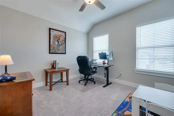 a workspace with chandelier