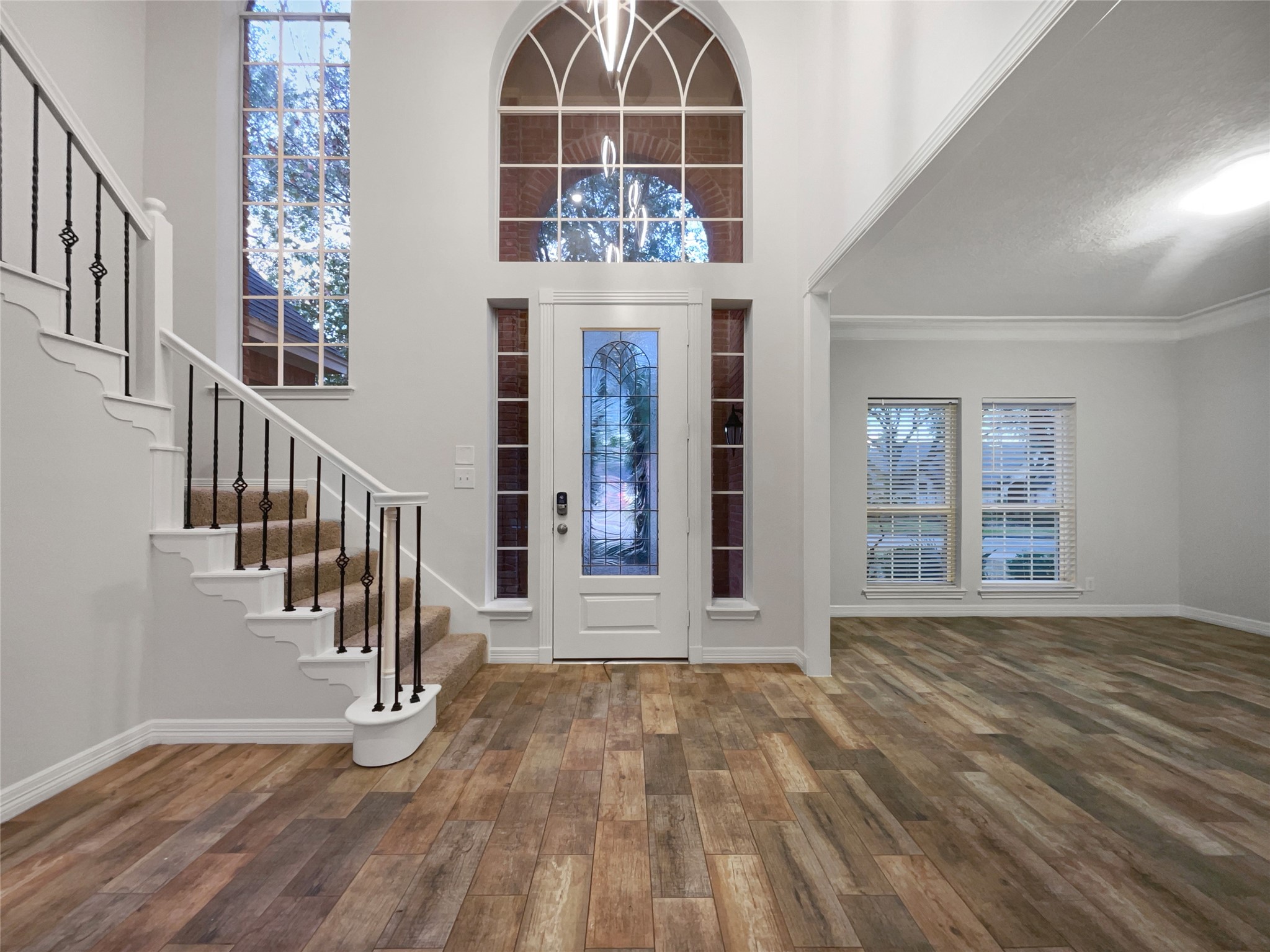 6107 Hampton Way Court Spring, TX 77389 - Photo 6 of 22 a view of an entryway with wooden floor