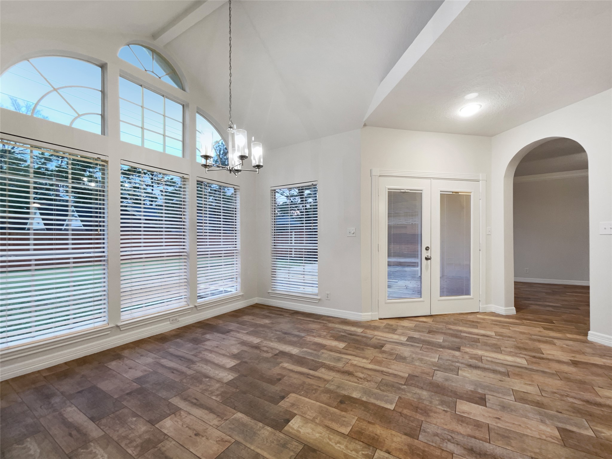 6107 Hampton Way Court Spring, TX 77389 - Photo 10 of 22 a view of a livingroom with wooden floor and entryway