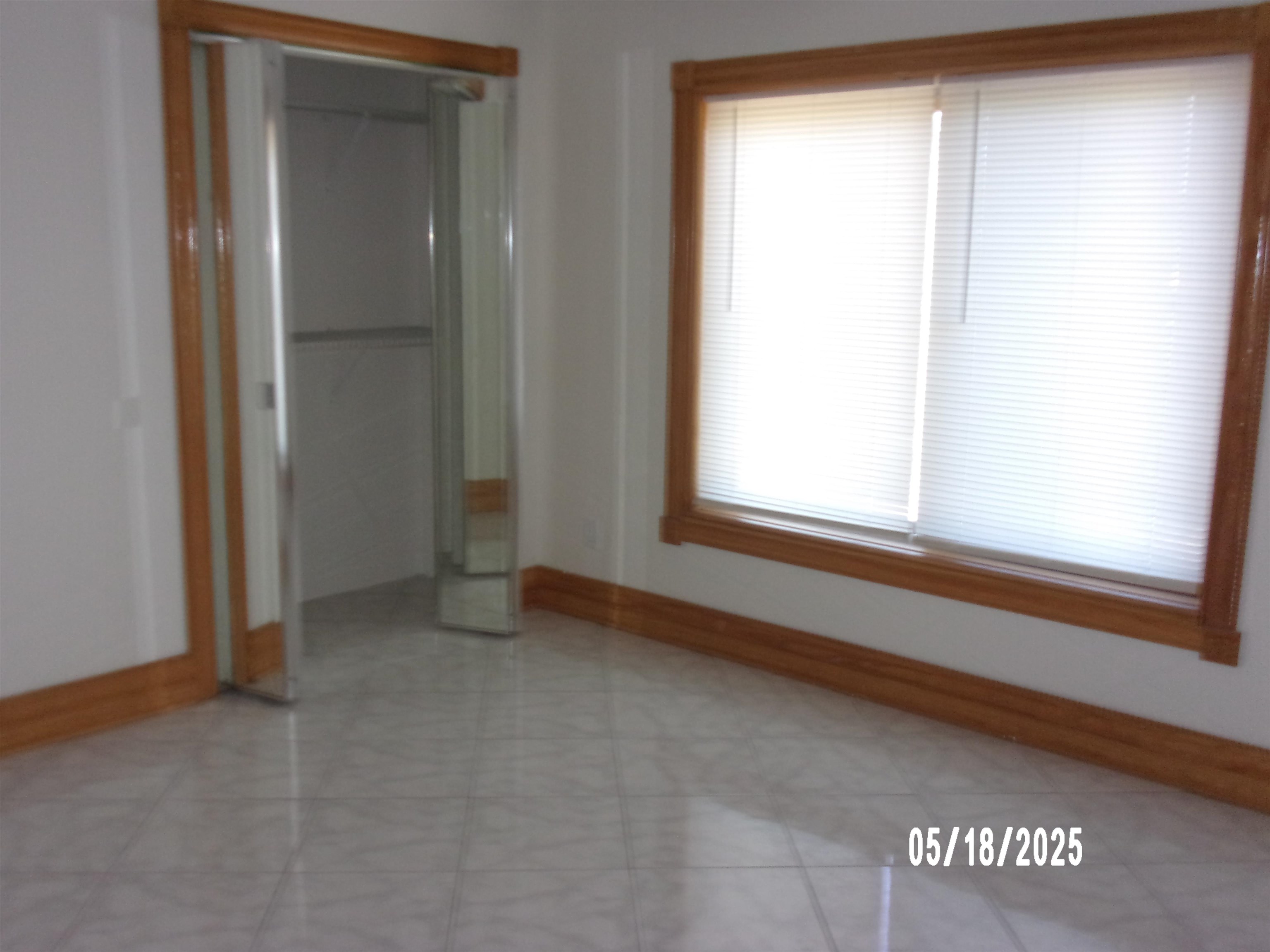 239 Cornell Road St. Augustine, FL 32086 - Photo 17 of 27 a view of an empty room with a window
