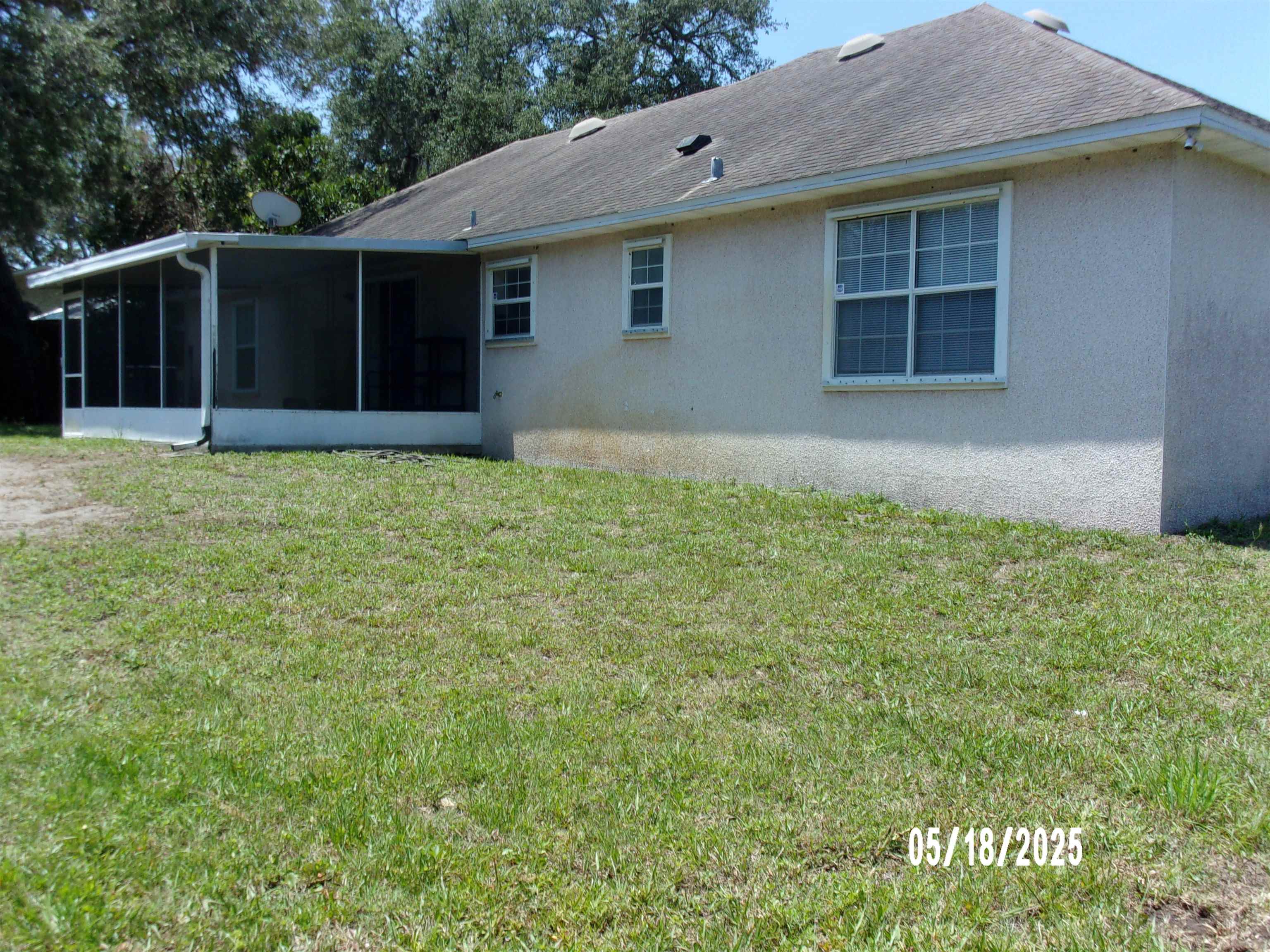 239 Cornell Road St. Augustine, FL 32086 - Photo 23 of 27 a house with yard and a space