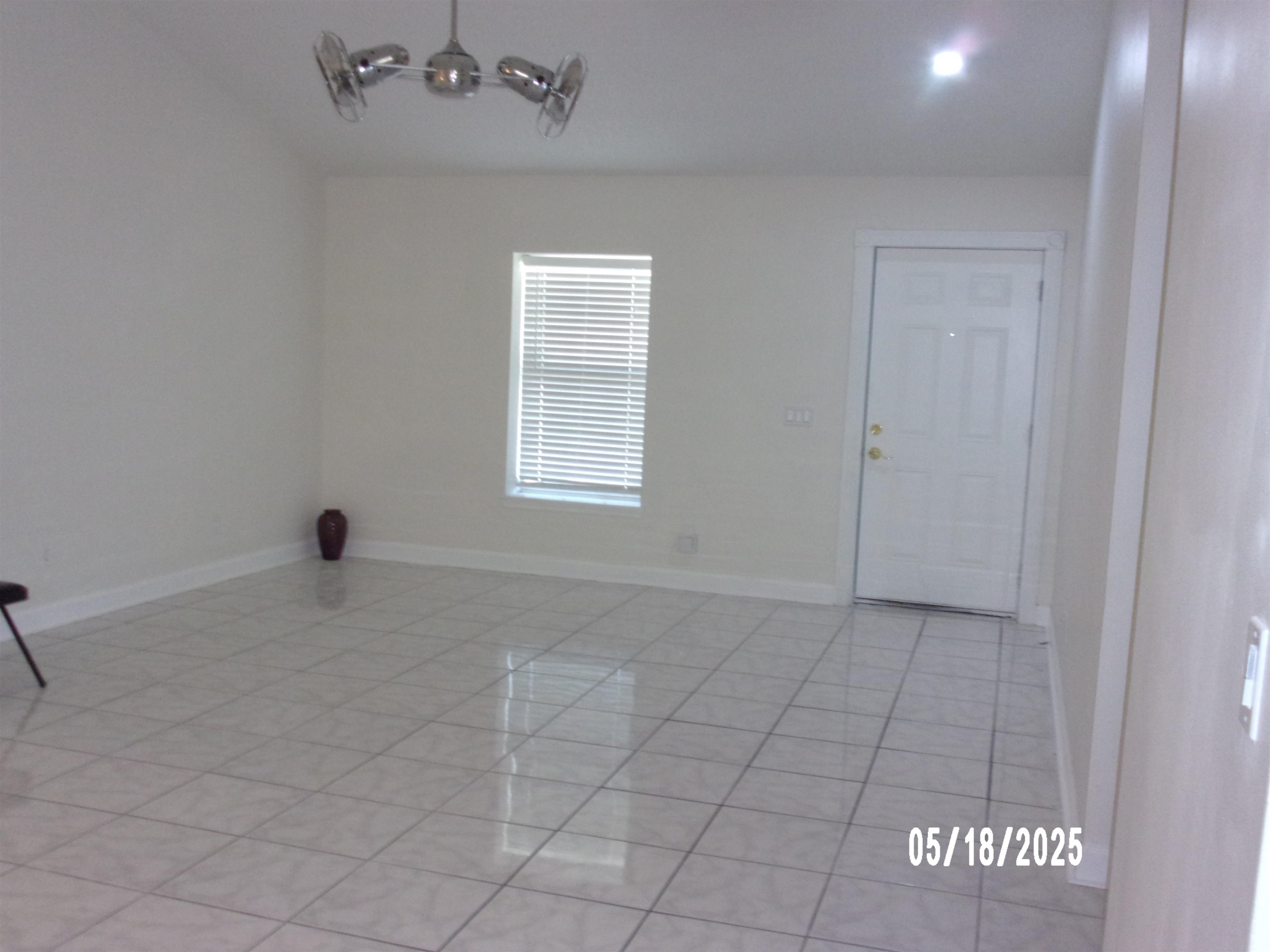 239 Cornell Road St. Augustine, FL 32086 - Photo 6 of 27 an empty room with windows