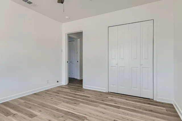 a view of a livingroom with wooden floor