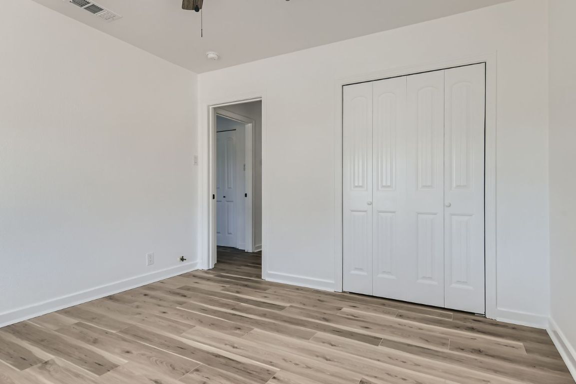 902 Hackberry Street Taylor, TX 76574 - Photo 14 of 18 a view of a livingroom with wooden floor