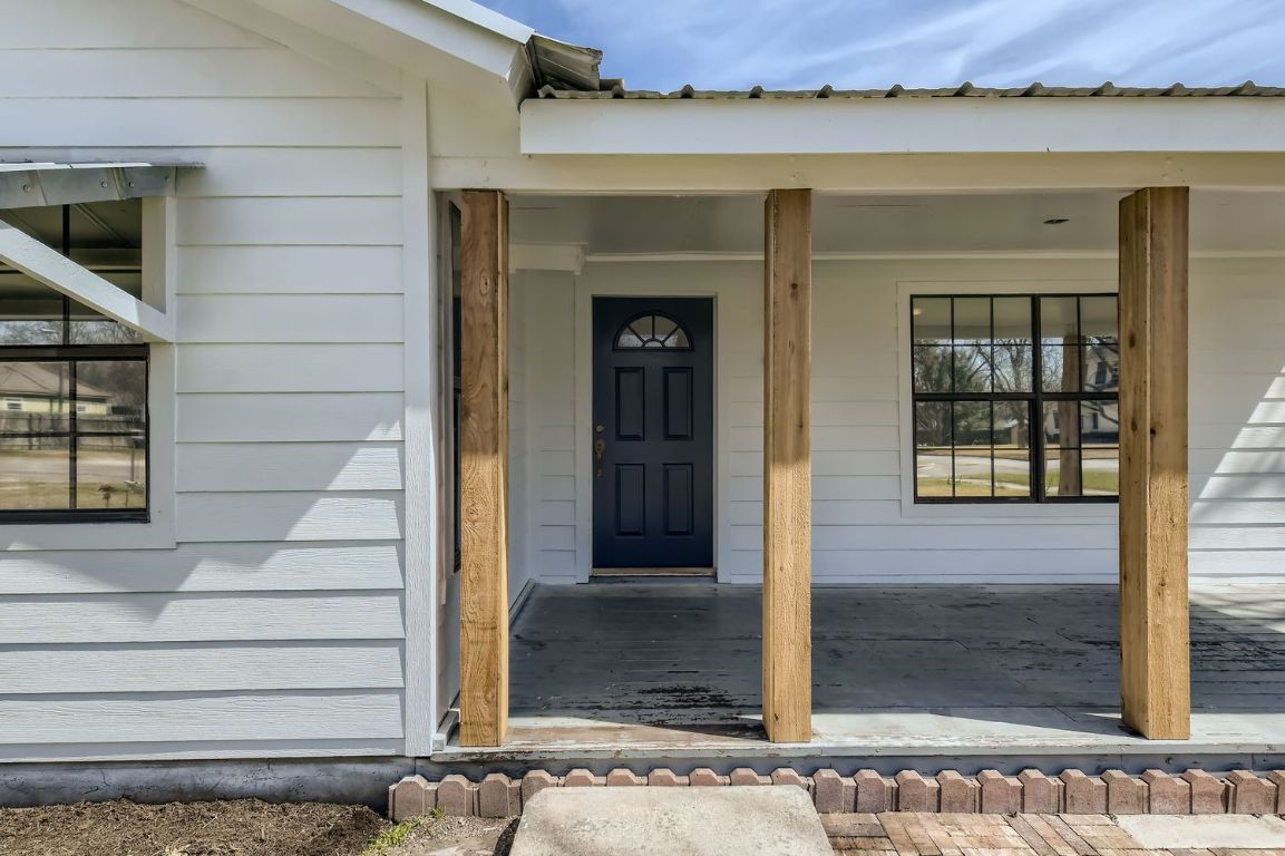902 Hackberry Street Taylor, TX 76574 - Photo 2 of 29 View of exterior entry featuring covered porch