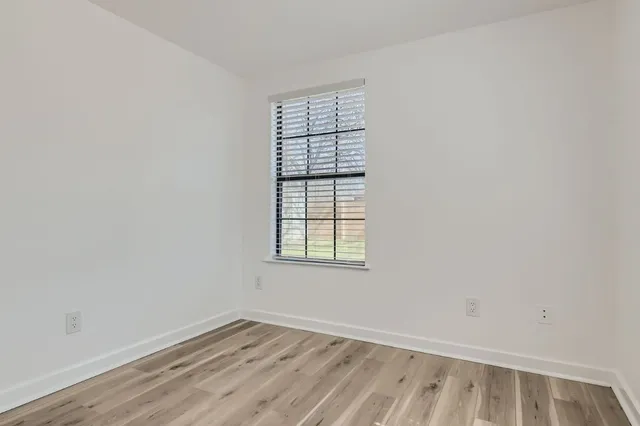 an empty room with a window