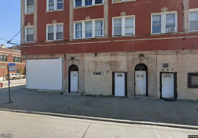 a front view of a building with windows