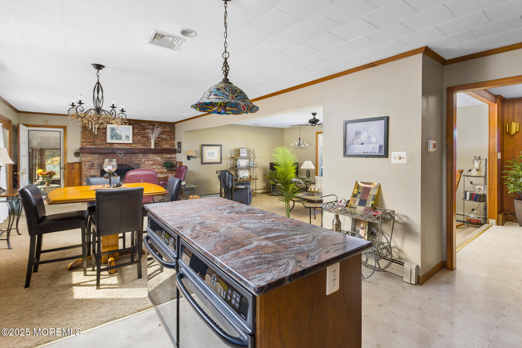 193 Burlington Path Road Cream Ridge, NJ 08514 - Photo 18 of 51 a open kitchen with a table and chairs in it