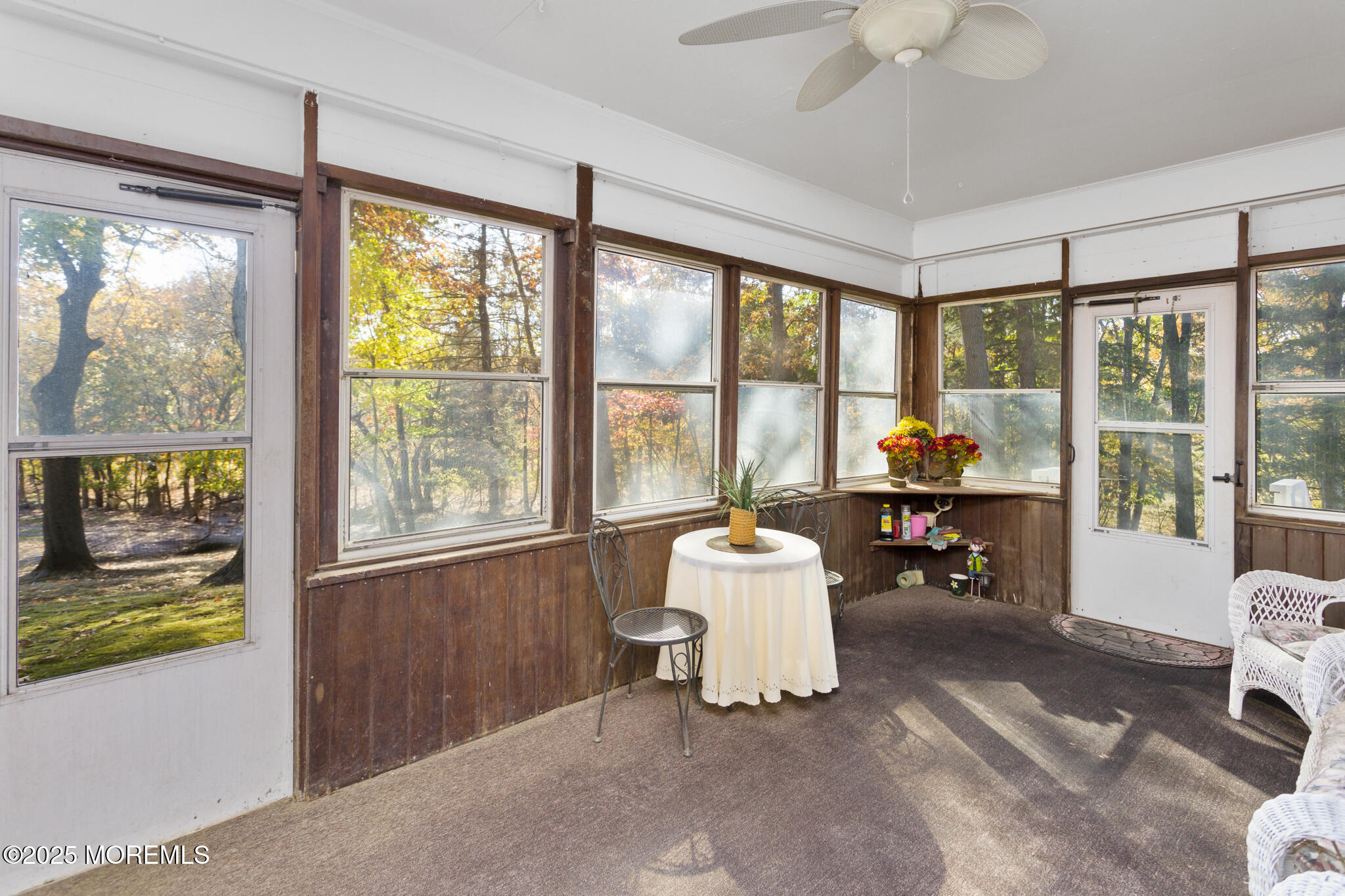 193 Burlington Path Road Cream Ridge, NJ 08514 - Photo 31 of 51 a living room with furniture and a floor to ceiling window