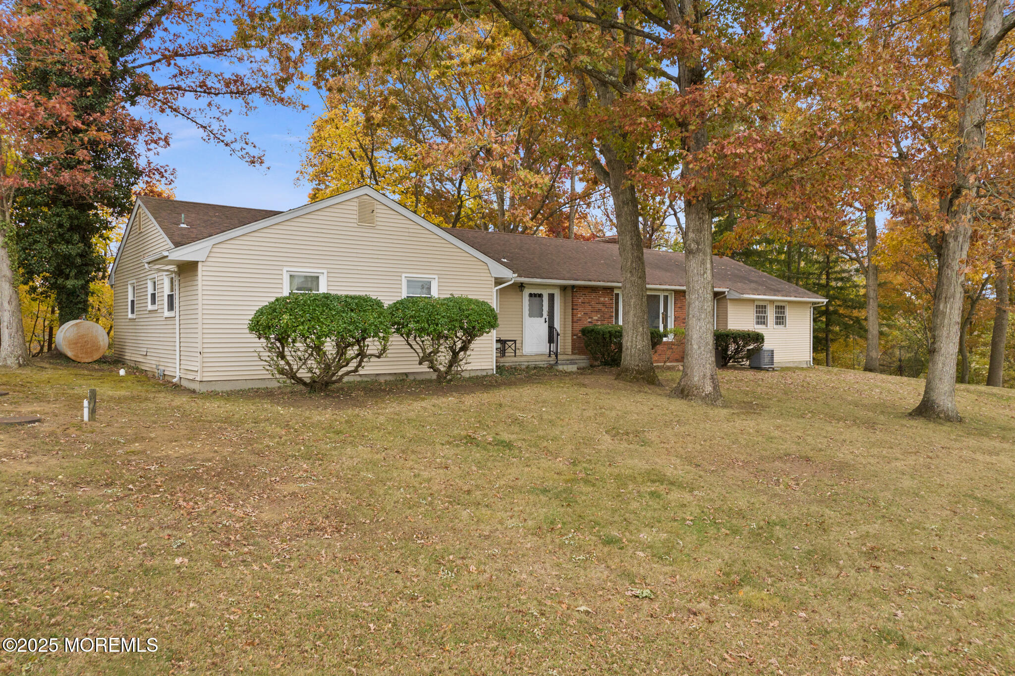193 Burlington Path Road Cream Ridge, NJ 08514 - Photo 5 of 51 a front view of a house with a garden and yard