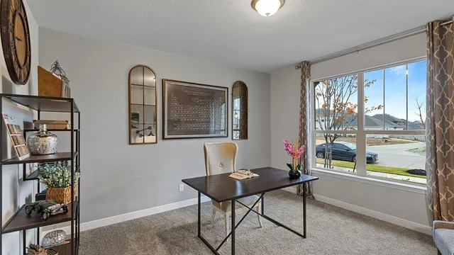 a bathroom with a tub a sink and mirror
