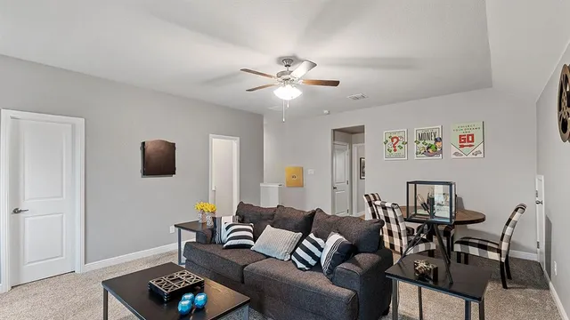 a bedroom with a bed and a desk