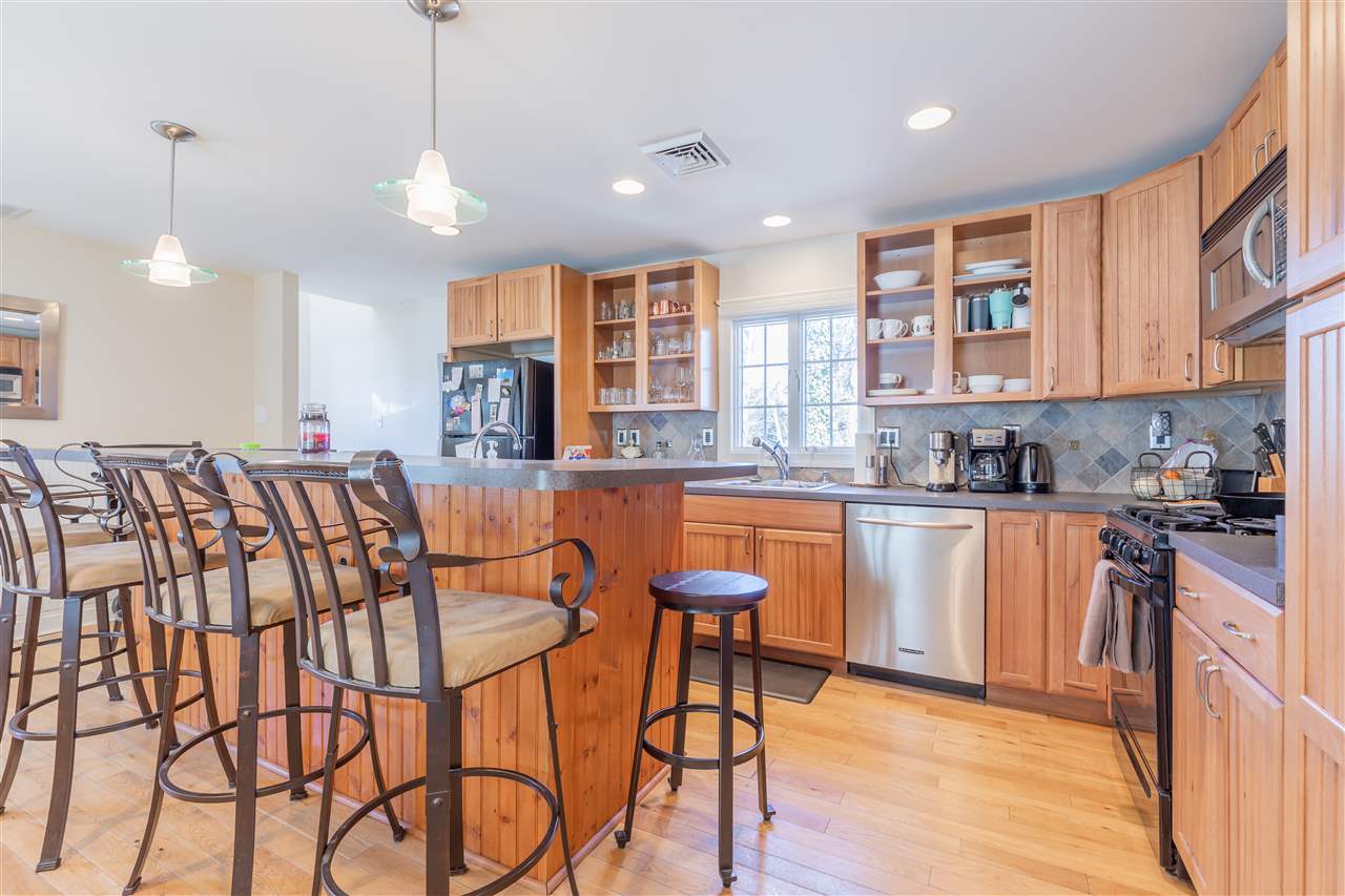 381 Highway 9 Erma, NJ 08204 - Photo 14 of 38 a kitchen with stainless steel appliances granite countertop a kitchen island a stove and a sink
