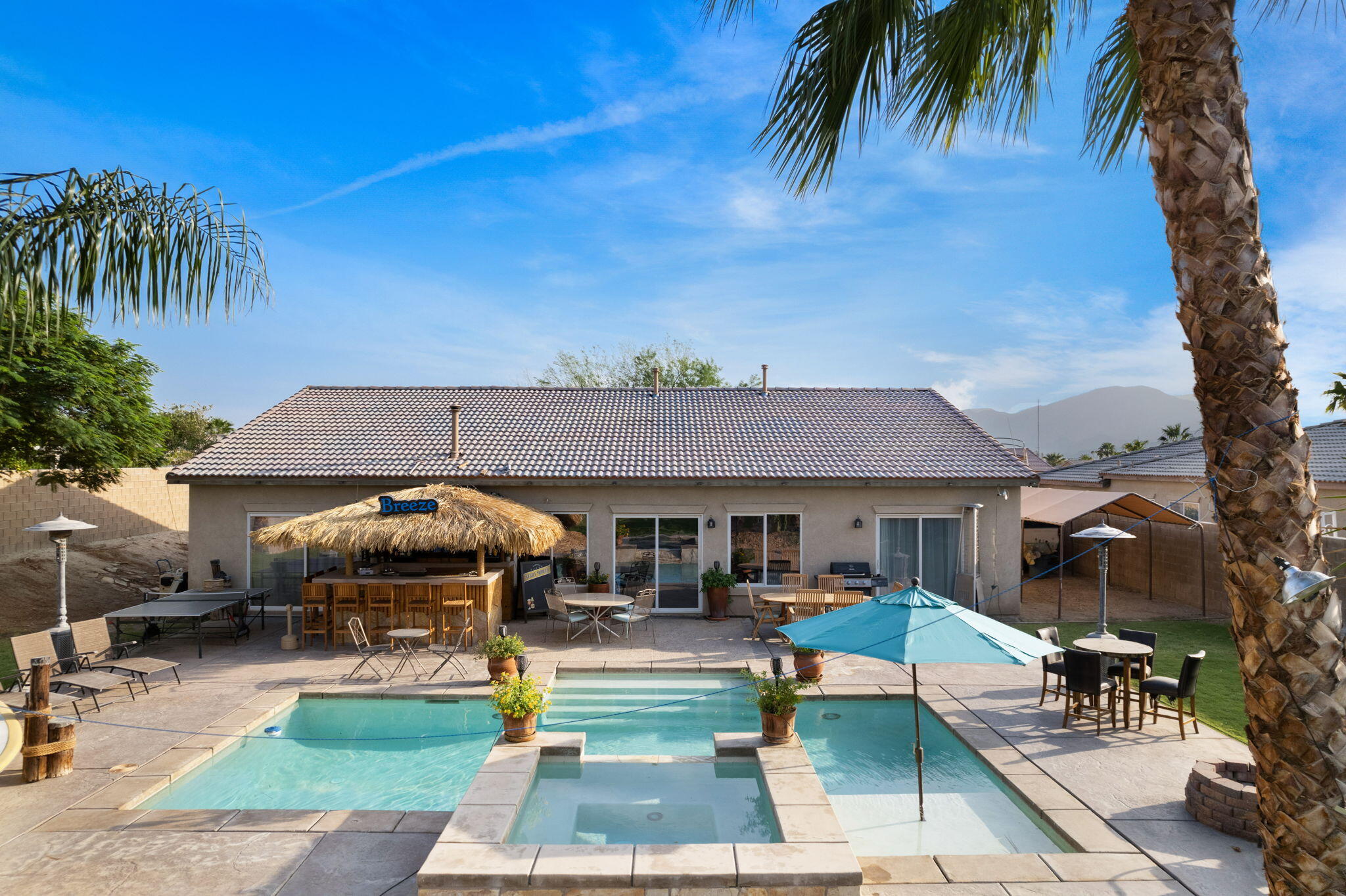 83258 Brighton Crest Drive Indio, CA 92203 - Photo 13 of 69 a view of a yard with furniture