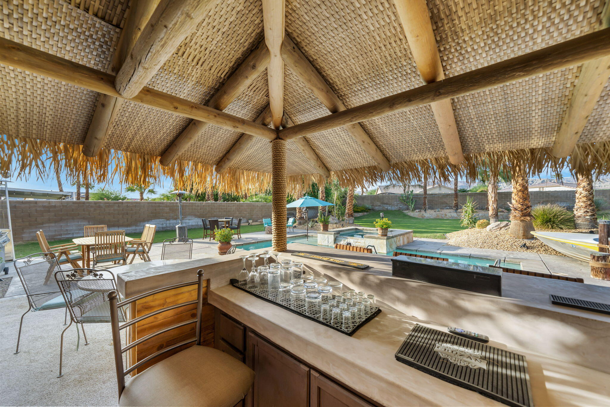 83258 Brighton Crest Drive Indio, CA 92203 - Photo 29 of 69 a room with lot of tables and chairs