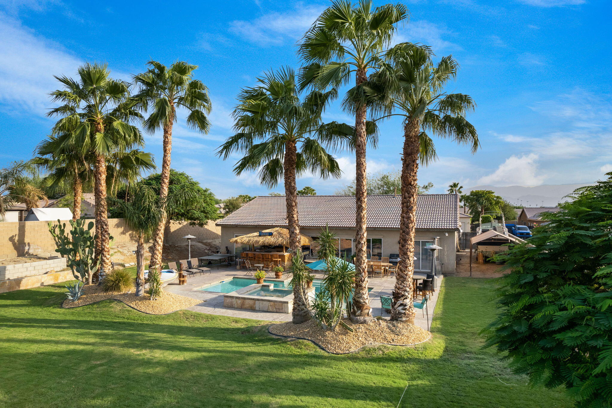 83258 Brighton Crest Drive Indio, CA 92203 - Photo 3 of 69 a view of a park with palm trees