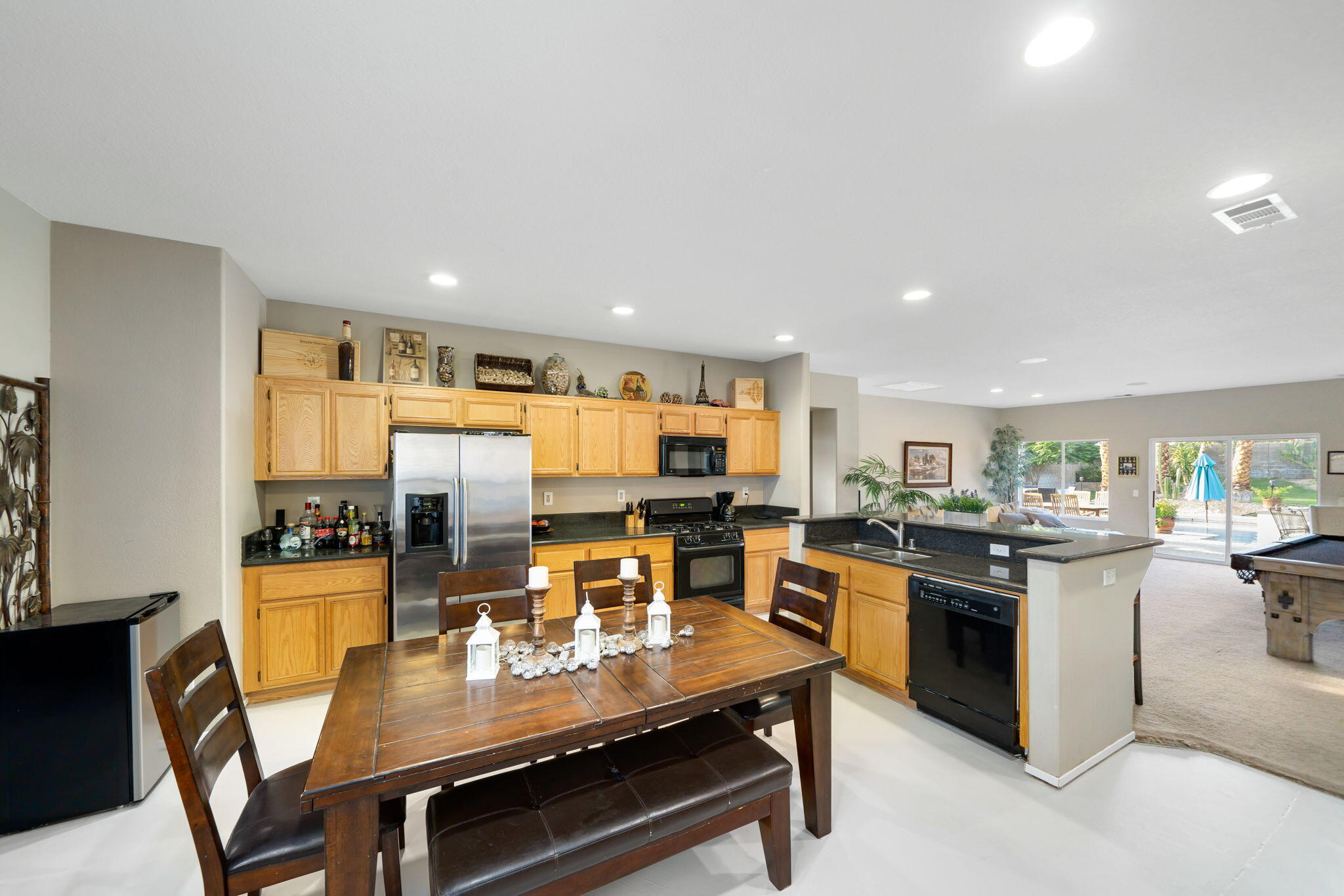 83258 Brighton Crest Drive Indio, CA 92203 - Photo 41 of 69 a view of a dining room with furniture